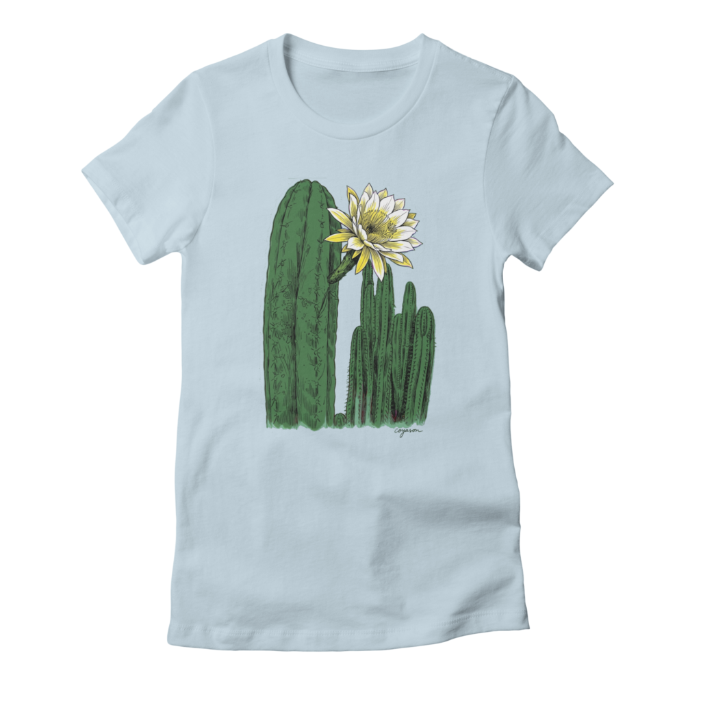A pale blue t-shirt printed with a drawn group of Huachuma columns, the tallest carrying a wide white night flower