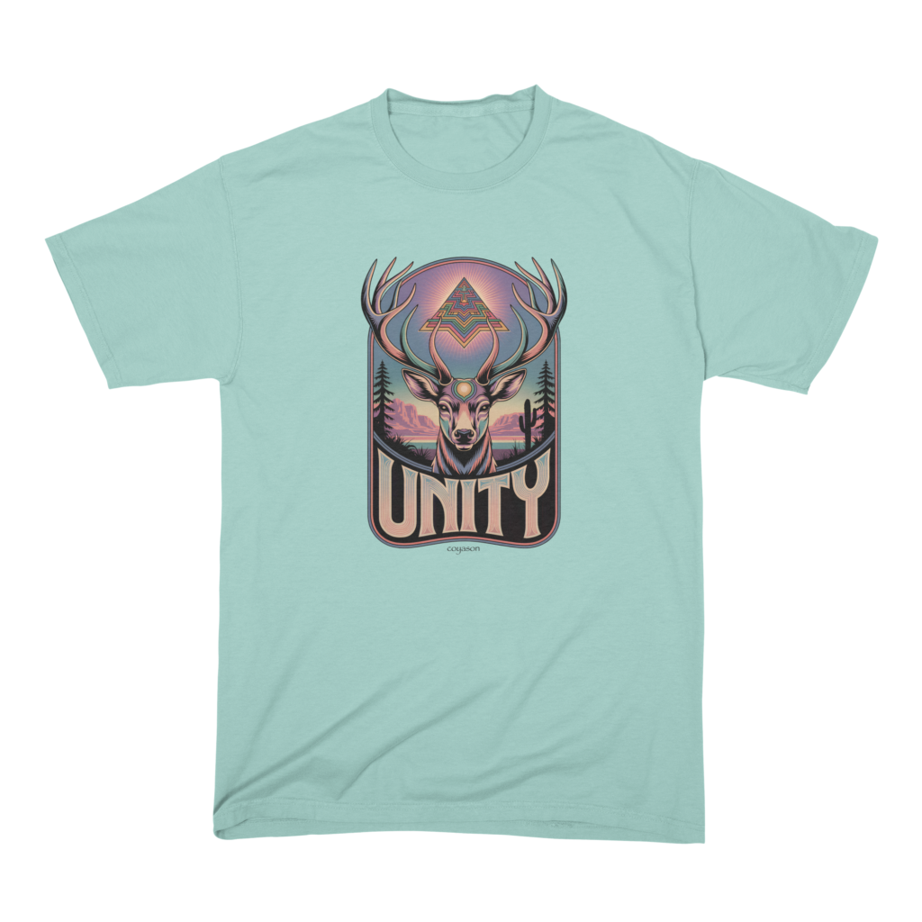 A pale green t-shirt printed with the Unity design, a stag facing forward under a stepped diamond with a desert behind it